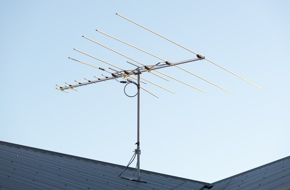 A Large Antenna Is Sitting On Top Of A Roof — Coastwide Antennas In Kincumber, NSW